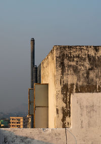 Exterior of old building against clear sky