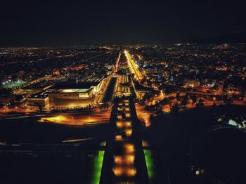 High angle view of illuminated city at night