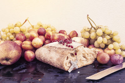 Close-up of grapes over white background