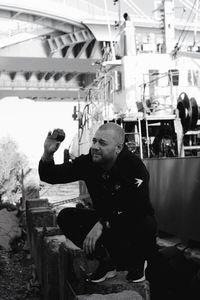 Side view of man photographing