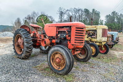 Tractor on field against sky