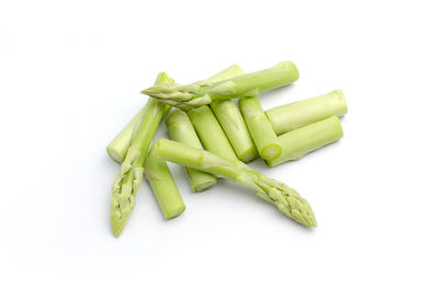 High angle view of green chili pepper against white background