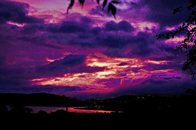 Scenic view of dramatic sky during sunset