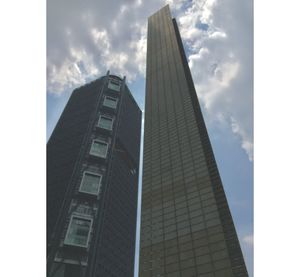 Low angle view of modern buildings against sky