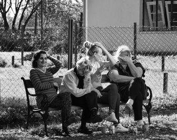 Group of people sitting outdoors