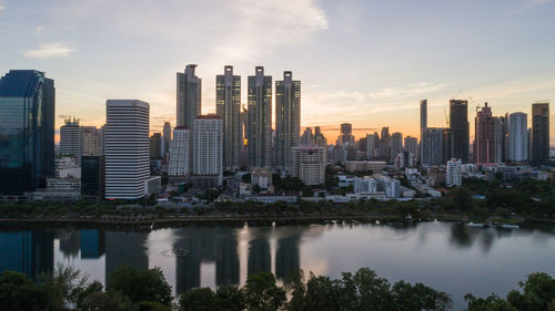 Modern buildings in city against sky