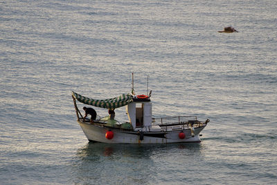 Boat sailing in sea