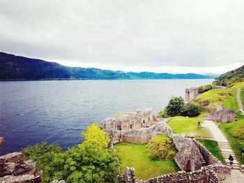 Scenic view of sea against cloudy sky