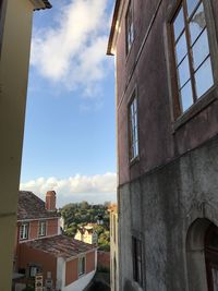Low angle view of old buildings in town