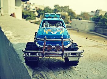 Close-up of toy car on road