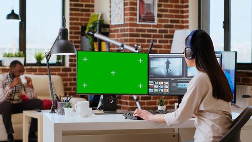 Side view of woman using mobile phone