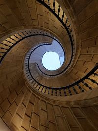 Low angle view of spiral staircase of building