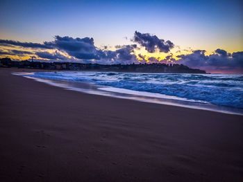 Scenic view of sea at sunset