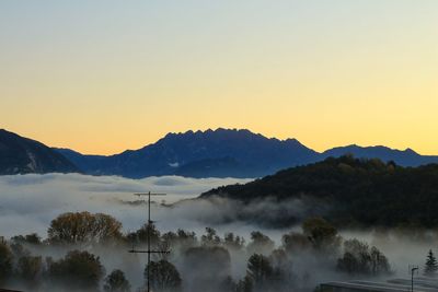 Scenic view of mountains against sky during sunset