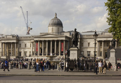 Tourists in front of historic building