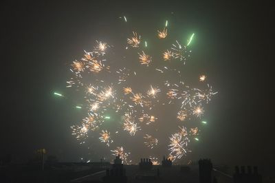 Firework display at night