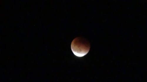 Low angle view of moon in sky