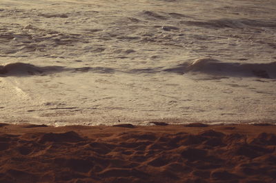 Close-up of sand at beach