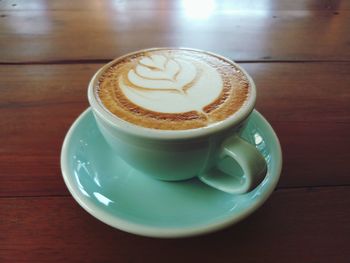 Close-up of cappuccino on table