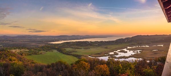 Scenic view of landscape against sky during sunset