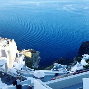 High angle view of buildings by sea