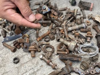 High angle view of man working on metal