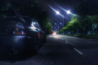 Cars on road at night