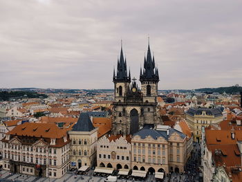 Aerial view of townscape against sky