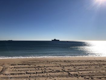 Scenic view of sea against clear sky