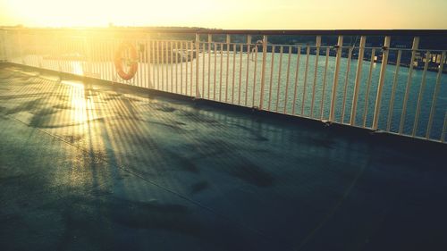 View of bridge in city at sunset