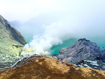 Panoramic view of volcanic mountain against sky