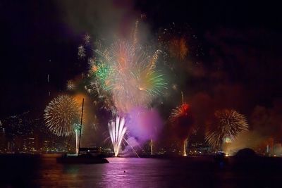 Firework display at night