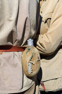 Close-up of man holding umbrella