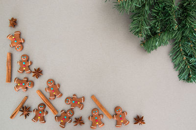 High angle view of gingerbread cookies with decoration on table