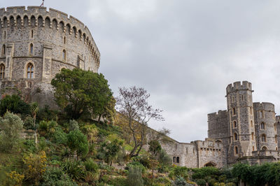 Old building against cloudy sky