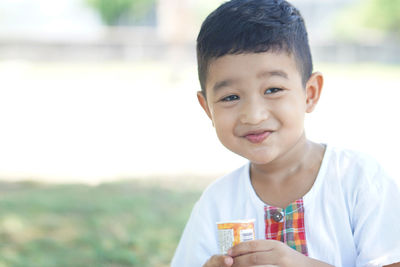 Portrait of cute boy smiling