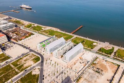 Aerial view of braco da prata industrial area along tagus river in lisbon, portugal.