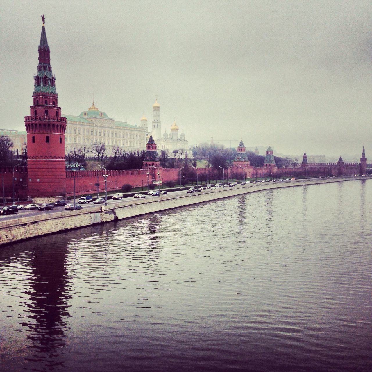 architecture, built structure, building exterior, water, waterfront, river, sky, city, reflection, transportation, travel destinations, connection, bridge - man made structure, canal, outdoors, travel, tower, famous place, dusk, rippled