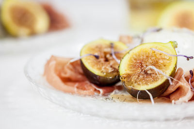 Close-up of fruits in plate