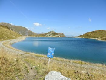 Scenic view of blue sea against sky