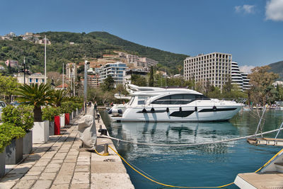 Boats moored at harbor