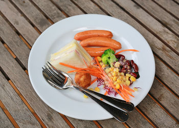 High angle view of breakfast served on table