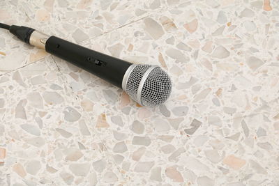 High angle view of microphone on floor