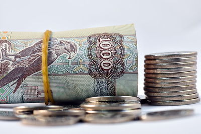 Close-up of coins on table