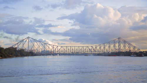 View of suspension bridge over sea