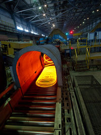 Illuminated walkway at night