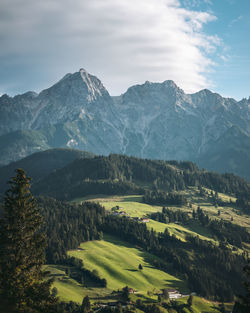 Scenic view of snowcapped mountains against sky