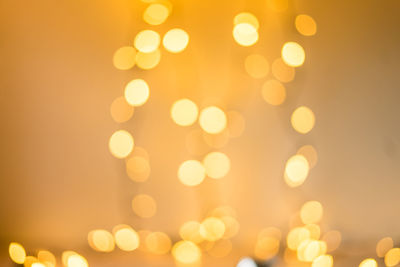 Abstract photo of light burst and glitter bokeh lights. image is blurred and filtered