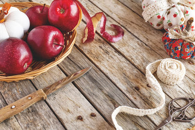 High angle view of apples in basket on table. fall  vibes. cozy autumn mood. 