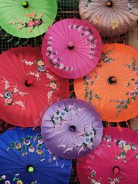 Low angle view of multi colored umbrellas